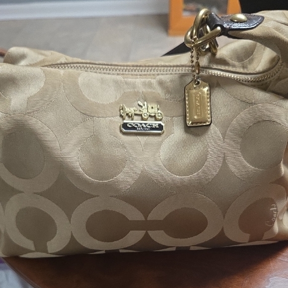 Coach Handbags - Coach Tan Shoulder Bag with Signature Monogram